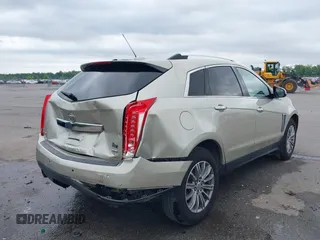 2015 Cadillac SRX Performance Collection with VIN 3GYFNCE34FS639168, listed as a IAAI auction lot 42191995 with 101,358 mi miles and . Bid and sale history available at DreamBid. Image 4.