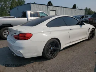 2017 BMW M4 with VIN WBS3R9C52HK709956, listed as a Copart auction lot 70524874 with 63,783 mi miles and Salvage Title. Bid and sale history available at carsss.com. Image 3.