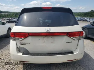 2014 Honda Odyssey Touring with VIN 5FNRL5H94EB080815, listed as a Copart auction lot 65244325 with 153,314 mi miles and Salvage title. Bid and sale history available at DreamBid. Image 6.