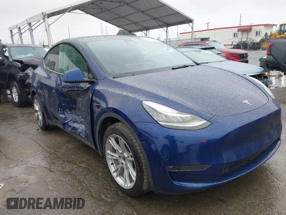 2022 Tesla Model Y Long Range with VIN 7SAYGDEE8NF511395, listed as a IAAI auction lot 41595310 with 65,156 mi miles and . Bid and sale history available at DreamBid. Image 1.