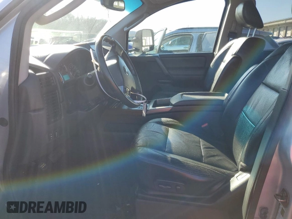 2011 Nissan Titan SV with VIN 1N6BA0ED6BN322680, listed as a Copart auction lot 85278084 with 157,665 mi miles and Salvage Title. Bid and sale history available at DreamBid. Image 7.