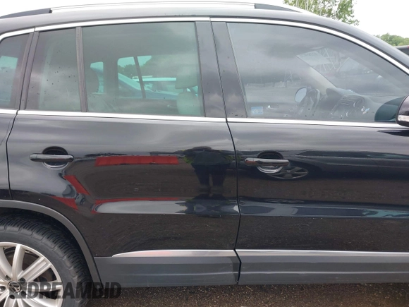 2012 Volkswagen Tiguan SE z VIN WVGBV7AX0CW558863, wystawiony jako IAAI lot #42285870 z przebiegiem 158 521 mil mil oraz . Historia ofert i sprzedaży dostępna na DreamBid. Obrazek 13.