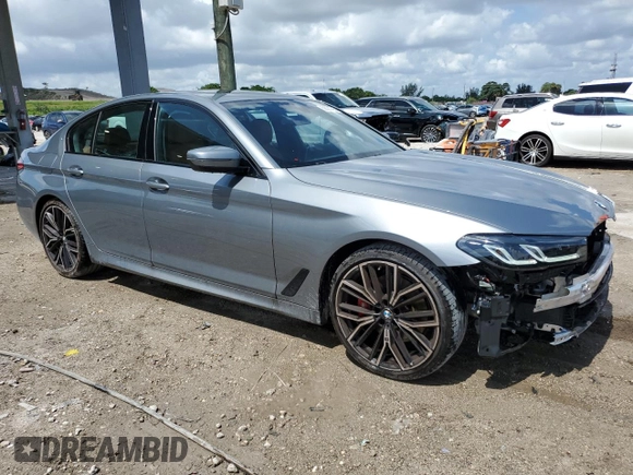 2023 BMW 5 Series 530i with VIN WBA53BH02PCM55841, listed as a Copart auction lot 58391765 with 6,947 mi miles and Salvage title. Bid and sale history available at DreamBid. Image 4.