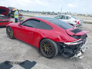 2018 Porsche 911 Carrera with VIN WP0AA2A92JS106143, listed as a IAAI auction lot 42009215 with 36,754 mi miles and . Bid and sale history available at DreamBid. Image 3.