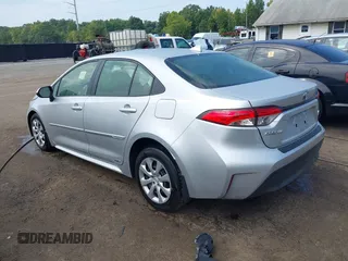 2023 Toyota Corolla Hybrid LE with VIN JTDBDMHE5P3000797, listed as a IAAI auction lot 40206015 with 22,371 mi miles. Bid and sale history available at carsss.com. Image 3.