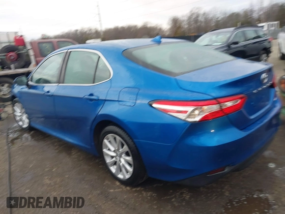 2020 Toyota Camry LE with VIN 4T1C11AK7LU324006, listed as a IAAI auction lot 41486878 with 76,290 mi miles. Bid and sale history available at carsss.com. Image 3.