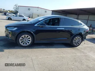 2017 Tesla Model X 90D with VIN 5YJXCBE25HF044617, listed as a IAAI auction lot 42096323 with 115,077 mi miles and . Bid and sale history available at DreamBid. Image 15.