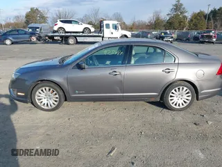 2011 Ford Fusion Hybrid with VIN 3FADP0L35BR316361, listed as a IAAI auction lot 41234840 with 168,768 mi miles and . Bid and sale history available at DreamBid. Image 14.