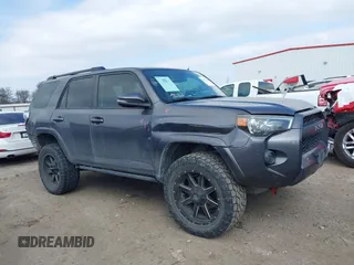 2015 Toyota 4Runner SR5 with VIN JTEZU5JRXF5091016, listed as a IAAI auction lot 41592829 with 196,988 mi miles and . Bid and sale history available at DreamBid. Image 13.