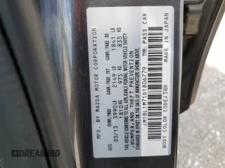 2013 Mazda 3 i Grand Touring with VIN JM1BL1M71D1806779, listed as a Copart auction lot 58071825 with 126,838 mi miles and Salvage title. Bid and sale history available at DreamBid. Image 12.