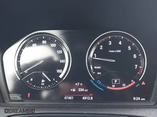 2018 BMW 2 Series 230i xDrive with VIN WBA2K1C52JVB64595, listed as a IAAI auction lot 41604748 with 47,461 mi miles. Bid and sale history available at carsss.com. Image 7.