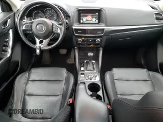 2016 Mazda CX-5 Grand Touring with VIN JM3KE4DY7G0761594, listed as a Copart auction lot 51514595 with 58,250 mi miles and Salvage Title. Bid and sale history available at DreamBid. Image 8.