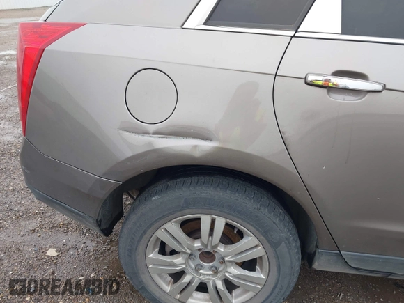 2012 Cadillac SRX Luxury Collection with VIN 3GYFNAE33CS587208, listed as a IAAI auction lot 42142976 with 218,380 mi miles and . Bid and sale history available at carsss.com. Image 14.