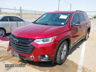 2021 Chevrolet Traverse LT with VIN 1GNERHKW9MJ117918, listed as a IAAI auction lot 42470808 with 77,535 mi miles and . Bid and sale history available at DreamBid. Image 2.
