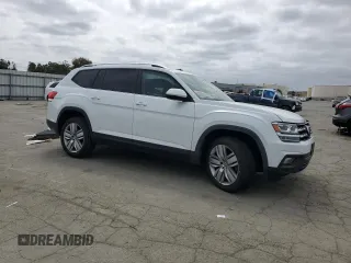 2019 Volkswagen Atlas SE with VIN 1V2WR2CA1KC603605, listed as a Copart auction lot 54623385 with 72,366 mi miles and Salvage title. Bid and sale history available at DreamBid. Image 4.