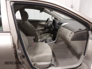 2010 Toyota Corolla with VIN 1NXBU4EE0AZ271333, listed as a IAAI auction lot 42308815 with 99,649 mi miles and . Bid and sale history available at DreamBid. Image 5.