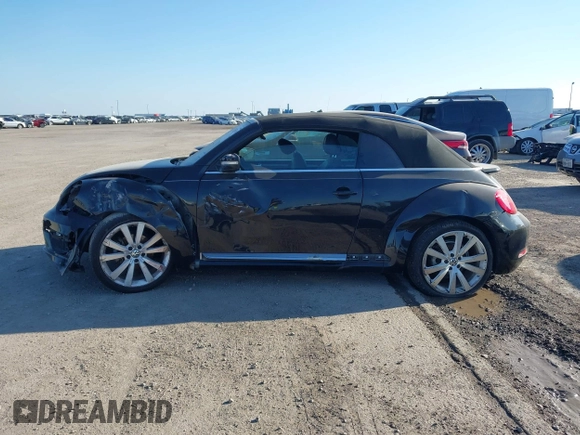 2014 Volkswagen Beetle 1.8T with VIN 3VW517AT4EM815243, listed as a IAAI auction lot 41245346 with 119,259 mi miles and . Bid and sale history available at DreamBid. Image 14.