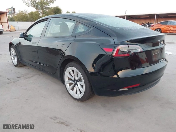 2023 Tesla Model 3 with VIN 5YJ3E1EA4PF552103, listed as a IAAI auction lot 40782218 with 20,997 mi miles. Bid and sale history available at carsss.com. Image 3.