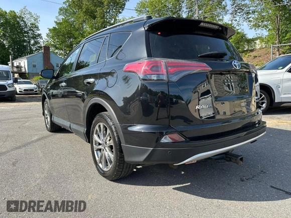 2016 Toyota RAV4 Limited with VIN JTMDJREV1GD020395, listed as a Copart auction lot 58956215 with 161,215 mi miles and Clean title. Bid and sale history available at DreamBid. Image 2.