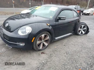 2012 Volkswagen Beetle 2.0T Turbo with VIN 3VWV67ATXCM663788, listed as a IAAI auction lot 41111055 with 152,454 mi miles. Bid and sale history available at carsss.com. Image 2.
