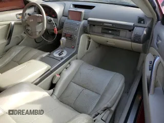 2003 Infiniti G35 w/Leather z VIN JNKCV54E93M218435, wystawiony jako Copart lot #41665965 z przebiegiem 131 987 mil mil oraz Szkoda całkowita • Salvage title. Historia ofert i sprzedaży dostępna na DreamBid. Obrazek 8.