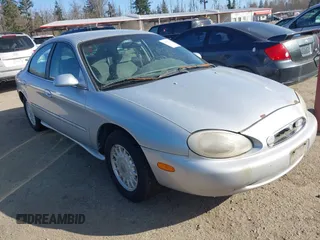 1996 Mercury Sable GS with VIN 1MELM50U5TG605997, listed as a IAAI auction lot 41751266 with 179,662 mi miles. Bid and sale history available at carsss.com. Image 1.