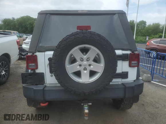 2018 Jeep Wrangler Sport S z VIN 1C4AJWAG8JL867954, wystawiony jako Copart lot #57175235 z przebiegiem 69 390 mil mil oraz Szkoda całkowita • Salvage title. Historia ofert i sprzedaży dostępna na DreamBid. Obrazek 6.
