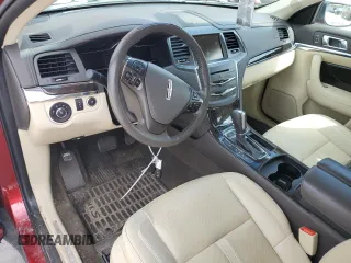 2013 Lincoln MKS EcoBoost with VIN 1LNHL9FT1DG609011, listed as a Copart auction lot 55793575 with Not provided miles and Salvage title. Bid and sale history available at DreamBid. Image 8.