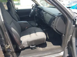2003 Dodge Durango Sport z VIN 1D4HS38NX3F571790, wystawiony jako IAAI lot #42331620 z przebiegiem 254 130 mil mil oraz . Historia ofert i sprzedaży dostępna na DreamBid. Obrazek 5.