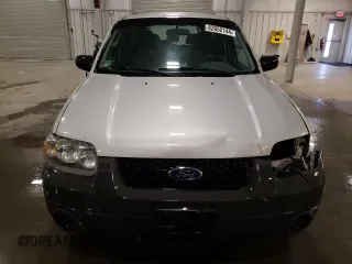 2007 Ford Escape XLS with VIN 1FMCU92Z77KA84801, listed as a Copart auction lot 82052144 with 180,774 mi miles and Salvage title. Bid and sale history available at DreamBid. Image 5.