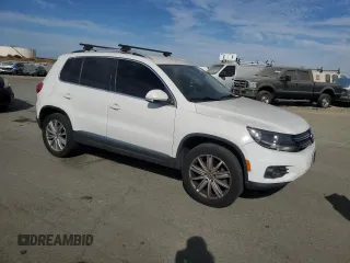 2012 Volkswagen Tiguan S with VIN WVGBV7AX3CW575463, listed as a Copart auction lot 77889064 with 168,520 mi miles and Salvage Title. Bid and sale history available at DreamBid. Image 4.
