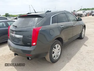 2014 Cadillac SRX Luxury Collection with VIN 3GYFNBE33ES599058, listed as a IAAI auction lot 42080556 with 128,917 mi miles. Bid and sale history available at carsss.com. Image 4.