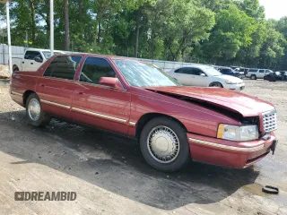 1999 Cadillac DeVille DHS z VIN 1G6KE54Y1XU727497, wystawiony jako Copart lot #56031715 z przebiegiem 76 245 mil mil oraz Szkoda całkowita • Salvage title. Historia ofert i sprzedaży dostępna na DreamBid. Obrazek 4.