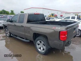 2014 Chevrolet Silverado 1500 LTZ with VIN 1GCVKSEC5EZ249444, listed as a IAAI auction lot 41904569 with 123,650 mi miles and . Bid and sale history available at DreamBid. Image 3.