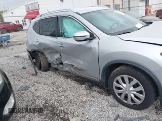 2016 Nissan Rogue SV with VIN JN8AT2MT0GW015301, listed as a IAAI auction lot 41930831 with 113,055 mi miles and . Bid and sale history available at carsss.com. Image 6.