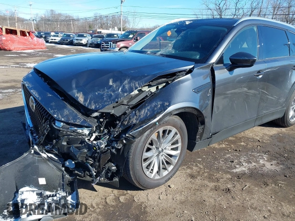 2024 Mazda CX-90 Preferred with VIN JM3KKBHDXR1146779, listed as a IAAI auction lot 41628645 with 14,744 mi miles and . Bid and sale history available at DreamBid. Image 6.