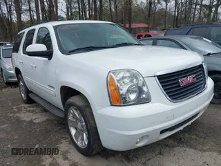 2013 GMC Yukon SLT with VIN 1GKS1CE00DR225296, listed as a IAAI auction lot 41854049 with 241,437 mi miles. Bid and sale history available at carsss.com. Image 1.