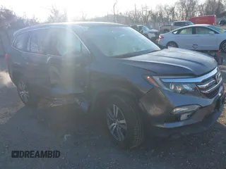 2017 Honda Pilot EX-L z VIN 5FNYF6H70HB069712, wystawiony jako IAAI lot #41828893 z przebiegiem 70 061 mil mil oraz . Historia ofert i sprzedaży dostępna na DreamBid. Obrazek 1.