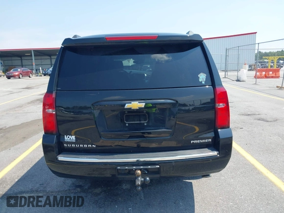 2019 Chevrolet Suburban LT with VIN 1GNSCJKC5KR304766, listed as a IAAI auction lot 42410264 with 105,171 mi miles and . Bid and sale history available at DreamBid. Image 16.