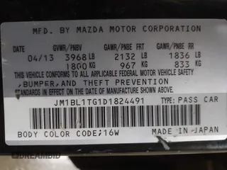 2013 Mazda 3 i SV with VIN JM1BL1TG1D1824491, listed as a IAAI auction lot 41603105 with 120,451 mi miles. Bid and sale history available at carsss.com. Image 9.