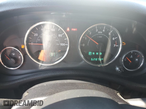 2015 Jeep Wrangler Unlimited Sahara with VIN 1C4BJWEG3FL584920, listed as a Copart auction lot 61843525 with 62,876 mi miles and Salvage title. Bid and sale history available at DreamBid. Image 9.