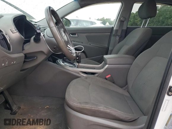 2012 Kia Sportage EX with VIN KNDPC3A2XC7192367, listed as a Copart auction lot 57698365 with 106,730 mi miles and Salvage title. Bid and sale history available at DreamBid. Image 7.