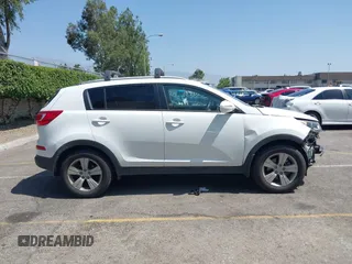 2013 Kia Sportage LX with VIN KNDPB3A23D7514304, listed as a IAAI auction lot 42544397 with 82,456 mi miles and . Bid and sale history available at DreamBid. Image 14.