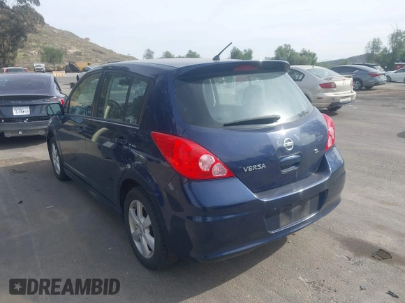2012 Nissan Versa S with VIN 3N1BC1CPXCK250182, listed as a IAAI auction lot 41697818 with 122,450 mi miles. Bid and sale history available at carsss.com. Image 3.