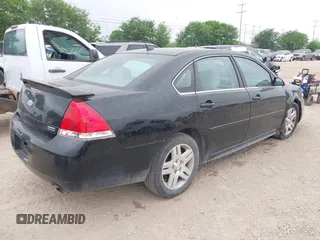 2013 Chevrolet Impala LT with VIN 2G1WB5E30D1202571, listed as a IAAI auction lot 41946958 with 104,291 mi miles and . Bid and sale history available at DreamBid. Image 4.