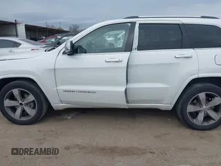 2014 Jeep Grand Cherokee Overland with VIN 1C4RJECG3EC266659, listed as a IAAI auction lot 41363419 with 142,896 mi miles. Bid and sale history available at carsss.com. Image 15.