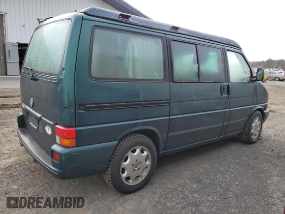 2002 Volkswagen EuroVan MV с VIN WV2NB47092H095600, выставлен на аукционе Copart как лот 50705065 с пробегом 223 049 миль миль и Чистый • Clean title. История ставок и продаж доступна на DreamBid. Изображение 3.