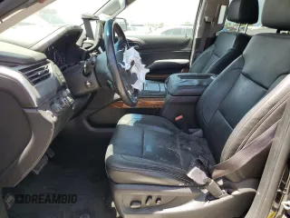 2015 Chevrolet Tahoe LTZ z VIN 1GNSKCKC8FR506151, wystawiony jako Copart lot #59948174 z przebiegiem Nie podano mil oraz Szkoda całkowita • Salvage title. Historia ofert i sprzedaży dostępna na DreamBid. Obrazek 7.