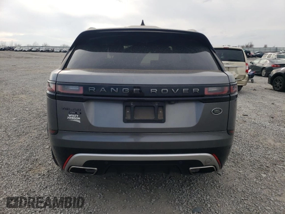 2018 Land Rover Range Rover Velar R-Dynamic SE с VIN SALYL2RV1JA730668, выставлен на аукционе Copart как лот 49334985 с пробегом 82 782 миль миль и Списание • Salvage title. История ставок и продаж доступна на DreamBid. Изображение 6.