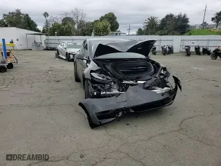 2025 Tesla Model Y Long Range with VIN 7SAYGDEE6SF308226, listed as a Copart auction lot 48006865 with 2,291 mi miles and Salvage Title. Bid and sale history available at carsss.com. Image 11.